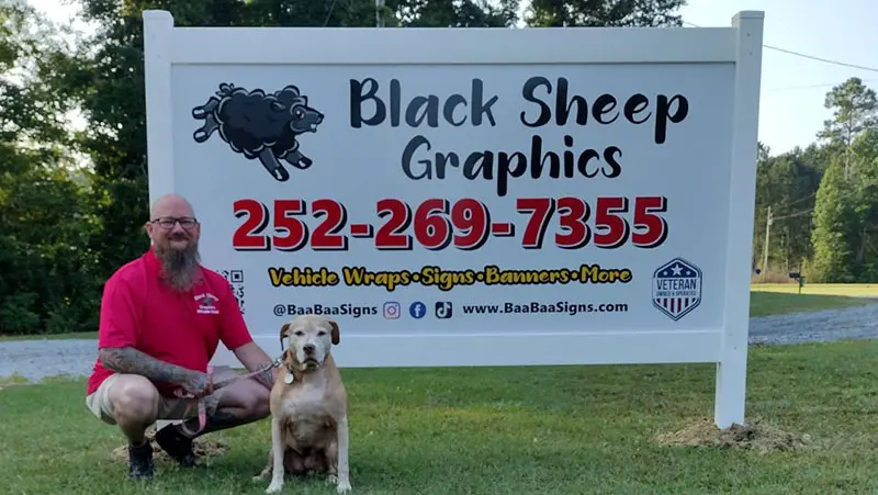 Owner Josh Stubbs with his former service dog Melodee
