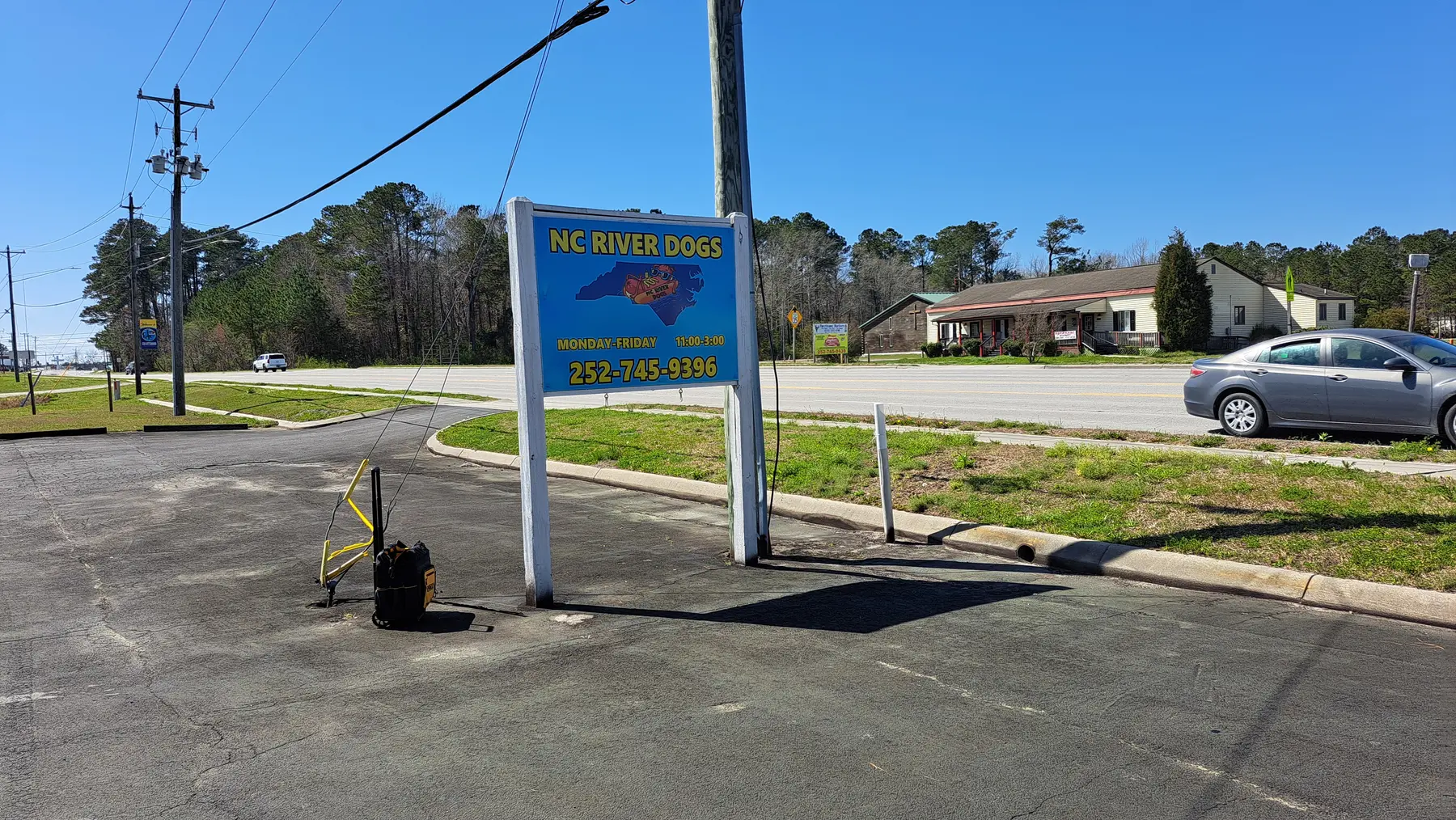 Roadside business sign with custom branding