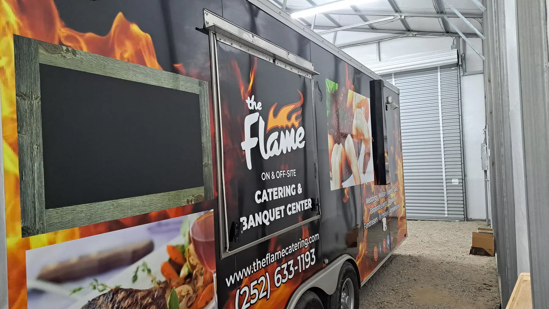 The Flame catering trailer with a full custom wrap